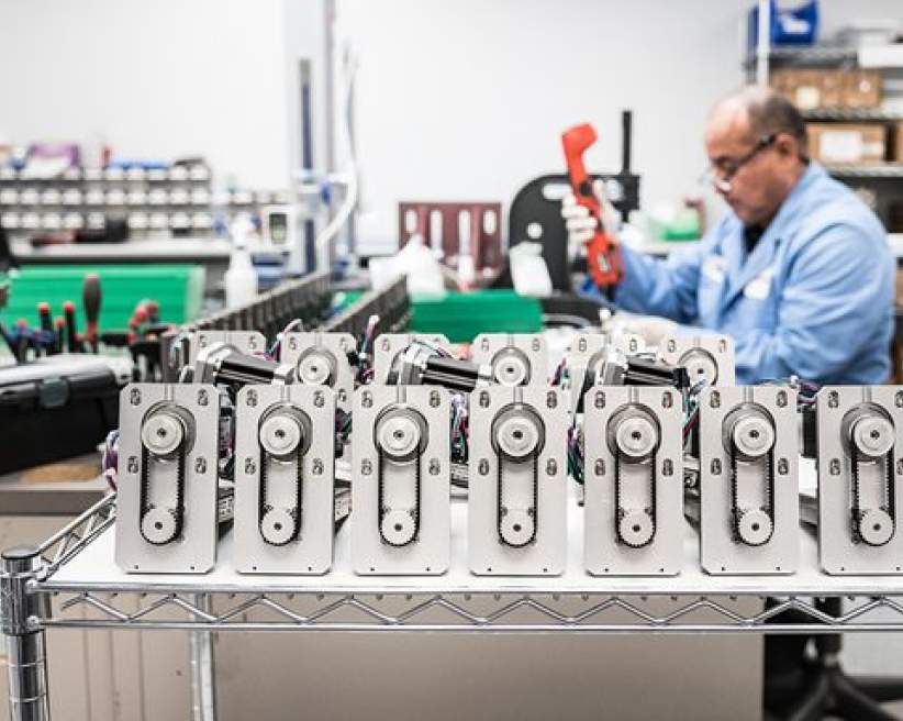 An engineer working in a manufacturing warehouse